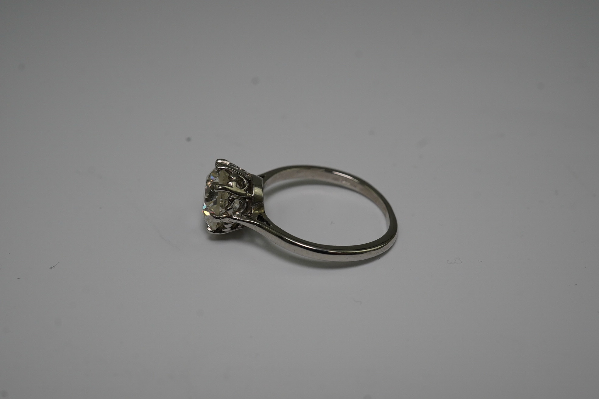 A platinum and solitaire diamond set ring